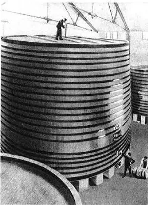 Giant wooden vat in the Byrrh cellar, historic photo