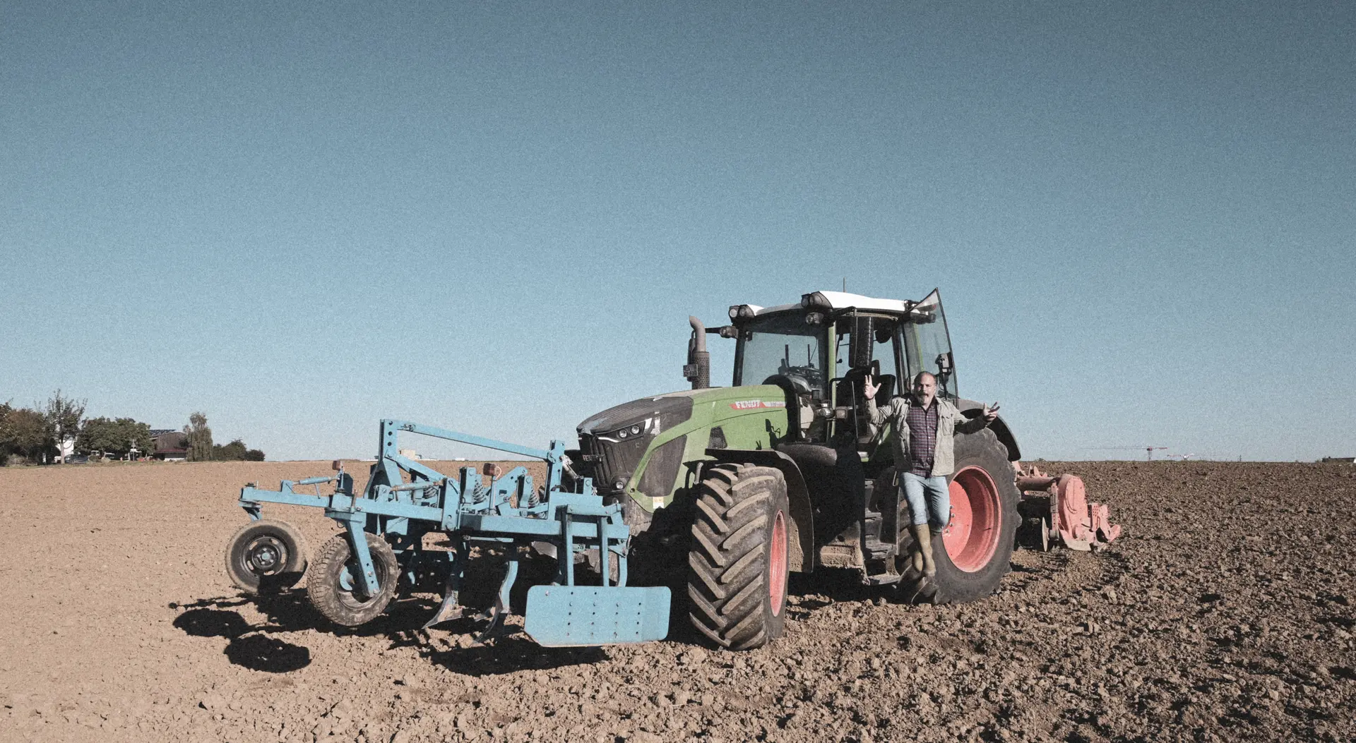 Tractor with planter in the field